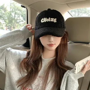 Winter warm lamb wool baseball cap for women, black teddy fleece hat with stylish letters.