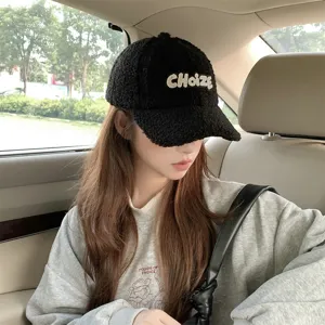 Winter black fleece baseball hat for women, cute embroidered letter design, warm casual stylish cap.