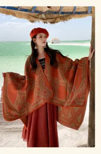 Elegante gebreide poncho sjaal in etnische stijl met geometrisch patroon