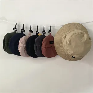Wasserdichter, verstaubarer Bucket Hat im Detail, schnelltrocknender Sonnenhut in vielen Farben.