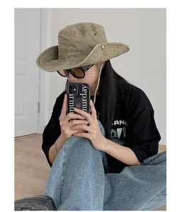 Vintage canvas western cowboy hat for outdoor hiking, fishing, and sun protection styling.
