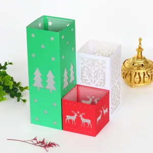 Details of Christmas hollow paper lantern set with laser-cut trees, snowflakes and deer.