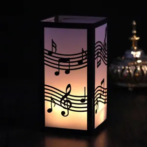 Black paper laser cut music notes night light lampshade for home decor and music festival.