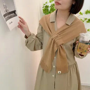 Knit cross scarf shawl for women, stylish khaki winter neck warmer and fashion accessory.