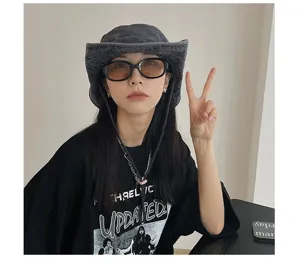 Vintage dark grey washed bucket hat for outdoor hiking, sun protection, and casual fashion wear.