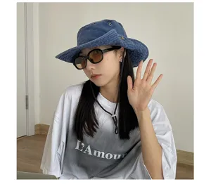 Classic denim bucket hat for outdoor sun protection, stylish casual headwear for daily wear.