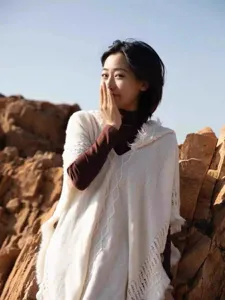 Cape pull en tricot à capuche style bohème avec franges pour femme voyage automne hiver