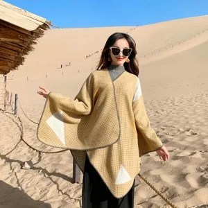 Outdoor travel style women split poncho detail, warm imitation cashmere ethnic winter shawl design.