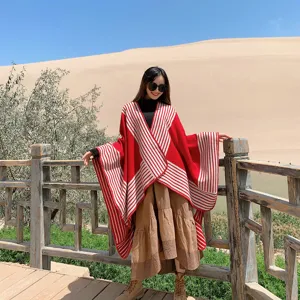 Featuring cozy imitation cashmere, this red and white striped winter warm cape shawl is ideal.