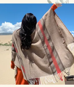 Bohemian split cape imitation cashmere shawl, detailed view showing textured fabric and fringe.