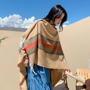 Cashmere-feel tassel poncho cape with classic striped design, warm winter outdoor shawl for women.