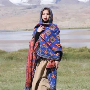 Ethnic style knitted hooded shawl with tassels, warm winter cloak for women travel photo outdoor.