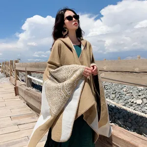 Autumn winter hooded knitted poncho cape for women, thick warm travel shawl with elegant print.