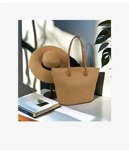 Elegante borsa tote in paglia con manici in pelle per vacanze estive al mare