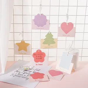 Tarjetas de felicitación plegables creativas con cuerda, notas bonitas y tarjetas de mensajes.