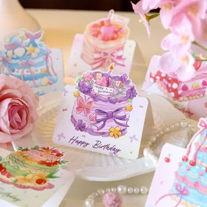 Detailed view of cute cartoon watercolor 3D birthday cake greeting cards with floral decor.