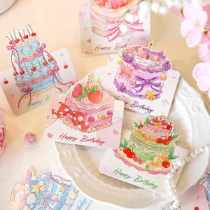 Closeup view of cute watercolor 3D birthday cake greeting cards, floral message card details.
