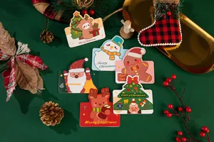 Lindas tarjetas de felicitación de Navidad y juego de regalo con bonitos diseños de dibujos.