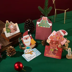 Bonito juego de tarjetas de felicitación navideñas con sobres y tarjetas de regalo.
