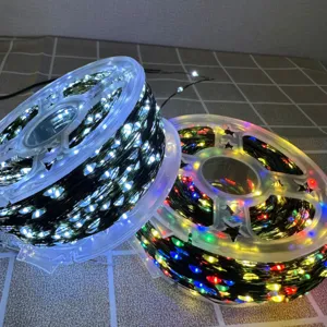 Cadena de luces LED de Navidad en carrete de plástico, alambre de cobre para decoración festiva.