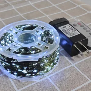Guirnalda de luces LED de estrella de alambre de cobre con bobina adaptador y mando a distancia