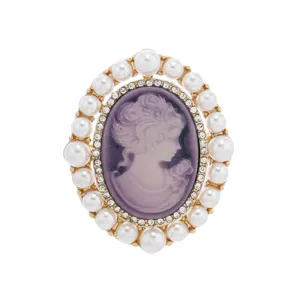 Vintage oval cameo brooch with purple profile portrait, faux pearls, and sparkling rhinestones.
