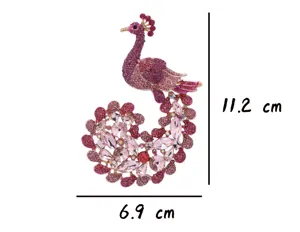 Close-up detail of the rhinestone peacock brooch showing exquisite crystal rhinestones and size.