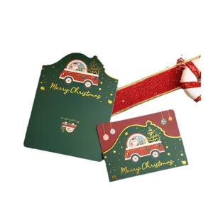 Kerst vouwende wenskaartenset met envelop en decoratief lint voor vakantiegeschenken.
