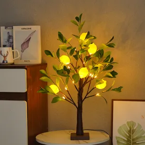 Detailansicht der LED Zitronenbaum Lampe mit leuchtenden gelben Früchten für gemütliches Ambiente.
