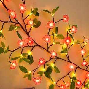 LED Kirschblüte Zweig Lichterkette Detail, warme leuchtende Blumen Wand Deko Licht.