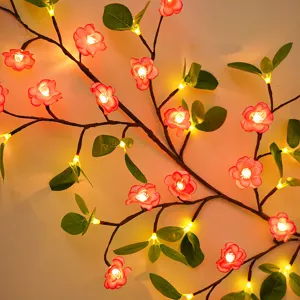 LED Zweig Lichterkette mit Kirschblüten und grünen Blättern für gemütliche Wand Deko.