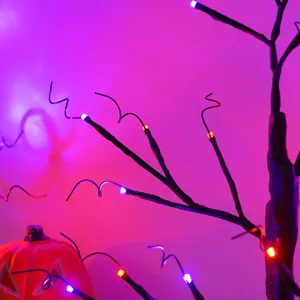 Primo piano dettagliato della lampada ad albero LED con luci colorate per decorazioni festive.
