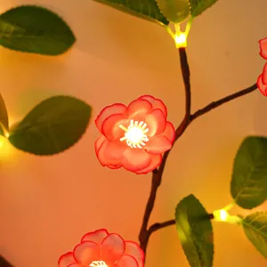 LED Zweig Licht Rebe Detailansicht, leuchtende Blumen Lichterkette für Wanddeko Atmosphäre.