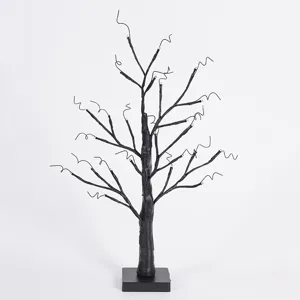 Vista ravvicinata dettagliata dell'albero luminoso a LED nero artificiale con punte dei rami.