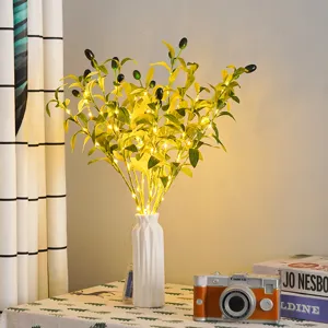 Artificial olive branch with LED lights in ceramic vase for home decor, wedding and hotel styling.