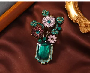 Vintage French green crystal vase brooch, elegant rhinestone floral pin for women's apparel.