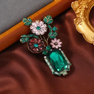 Vintage French green crystal vase brooch, elegant rhinestone flower pin for women apparel.