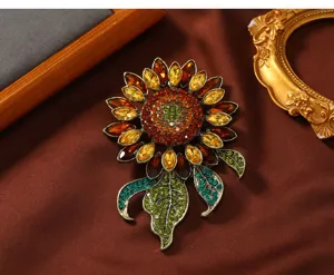 Close-up detail of the vintage crystal sunflower brooch, sparkling multi-color rhinestones.