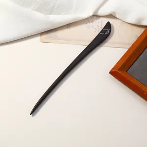 Fermacapelli in legno di ebano minimalista con design a costellazione, elegante bacchetta.