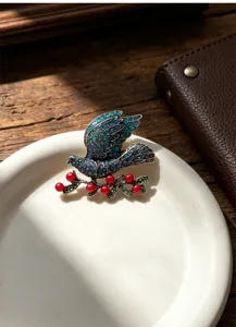 Vintage blue rhinestone peace dove brooch detail, exquisite crystal bird pin for women coat.
