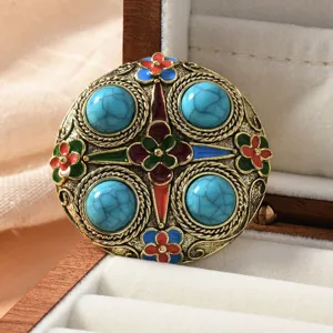 Retro Chinese style turquoise brooch with colorful enamel floral details for qipao and hanfu.