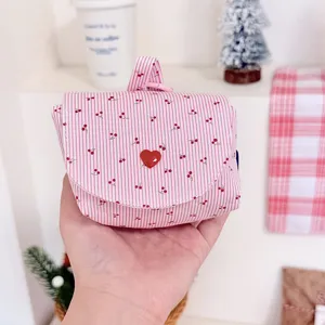 Pink striped cherry print mini cosmetic storage pouch with red heart button detail.