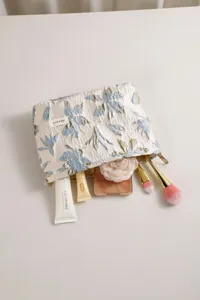 Floral jacquard fabric cosmetic bag, large capacity portable zipper makeup pouch for women.
