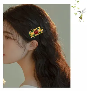 Pince a cheveux creuse en or mat chinois avec fleur emaillee rouge et strass pour style hanfu.