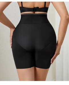 Detail view of black high-waisted shapewear shorts showing seamless rear contour design.