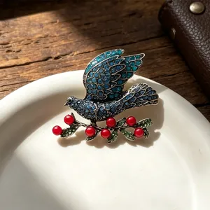 Vintage rhinestone peace dove brooch pin for women, elegant retro animal coat jacket accessory.
