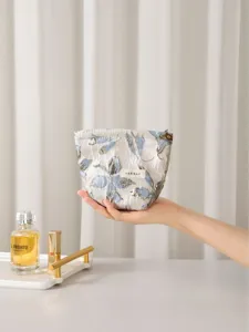 Sweet brocade cosmetic bag for women, portable large capacity zipper pouch makeup organizer.