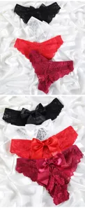 Nahaufnahme von sexy Damen-Spitzenhöschen mit eleganter Schleife, mehrfarbig präsentiert.