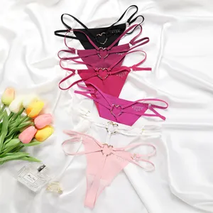 Sexy women double strap thong seamless ice silk breathable panty with cute heart metal ring.