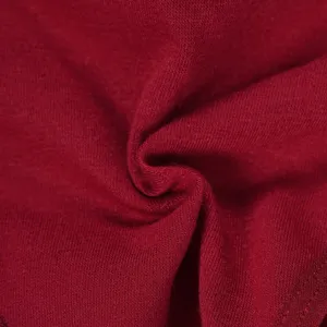 Burgundy cotton thong fabric texture close-up, breathable soft low-waist underwear detail.